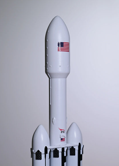 The main fairing with the US flag on the Falcon Heavy rocket