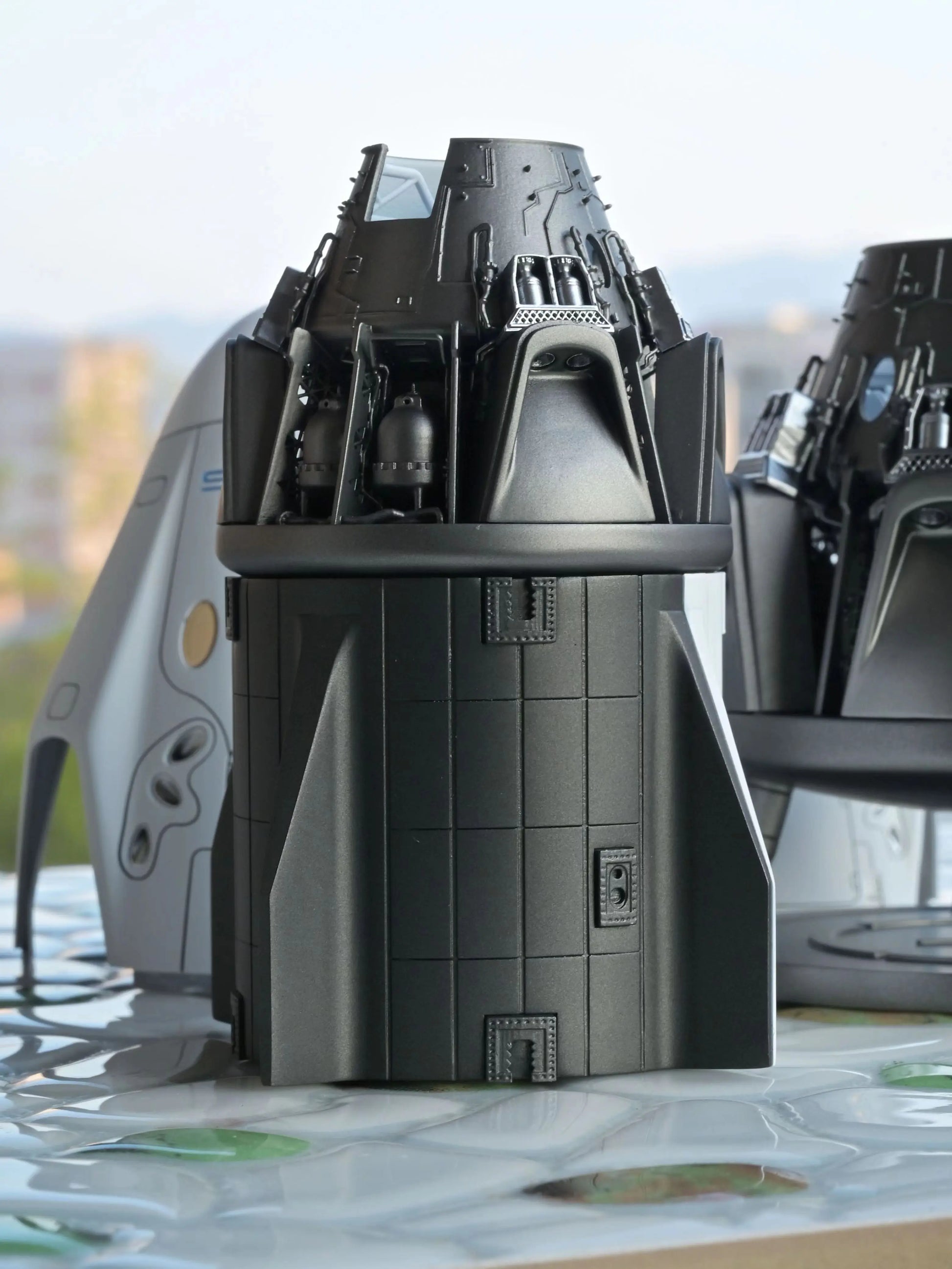 SpaceX Crew Dragon in 1/72 scale demonstration of details under the fuselage